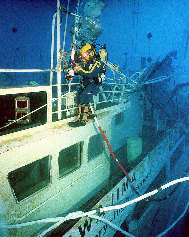 Salvage diver working on the Ehime Maru ship 115 feet below the surface in Honolulu, Hawaii