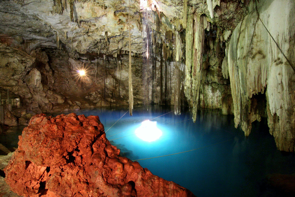 Stalactites and stalagmites of cenote in the Yucatan Peninsula, Mexico where divers have discovered very old human remains while exploring labyrinths